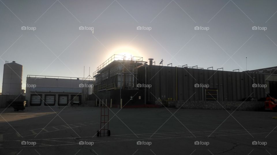 sunset on empty factory