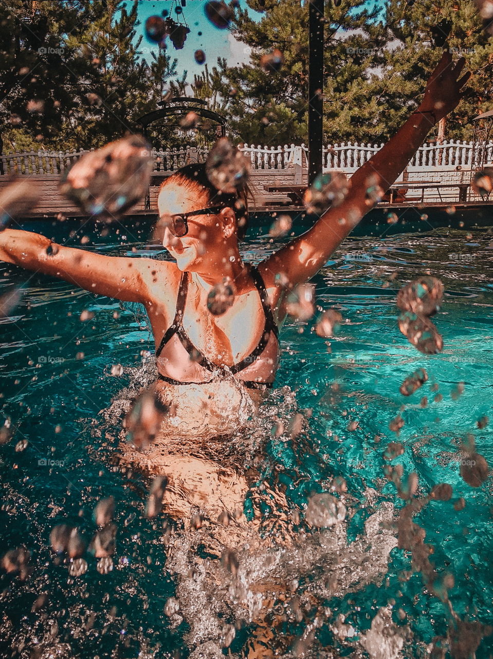 Girl swimming in the pool