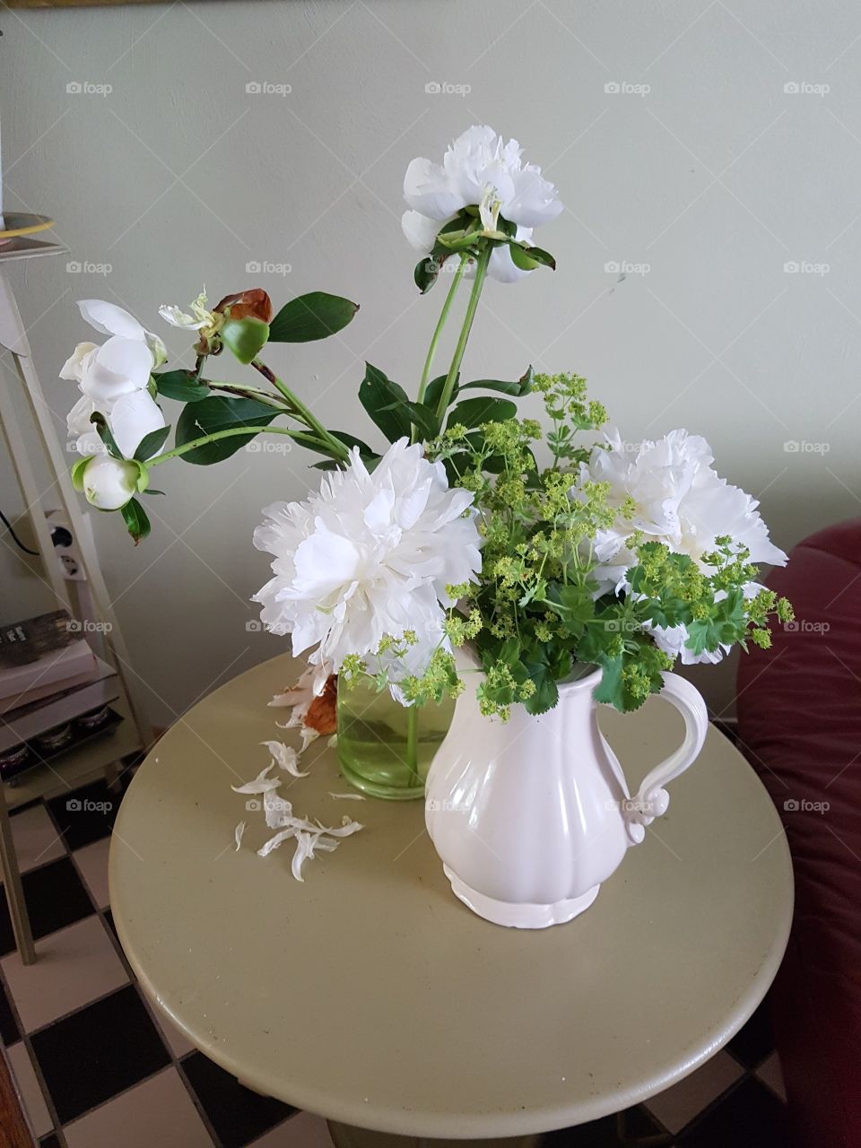 Peony flowers in antique vase