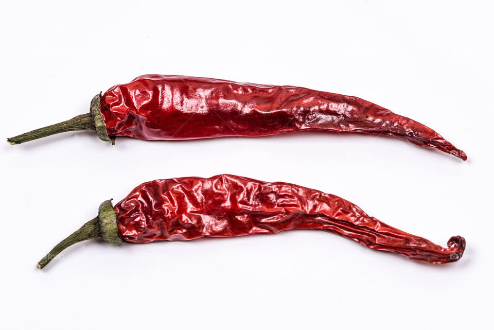 Two Hot Peppers on white background