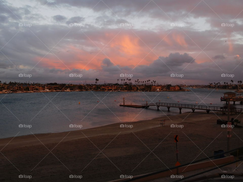 Reflection of pink sunset over Bay 