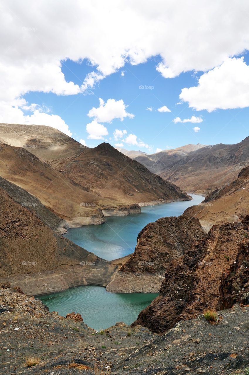 Tibetan lakes against cloudy sky