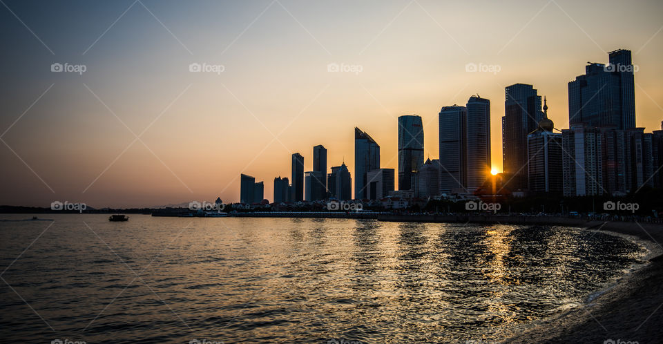 Asia china Qingdao old german colonies skyline skyscraper sunset seaside home of Tsibgtao beer downtown