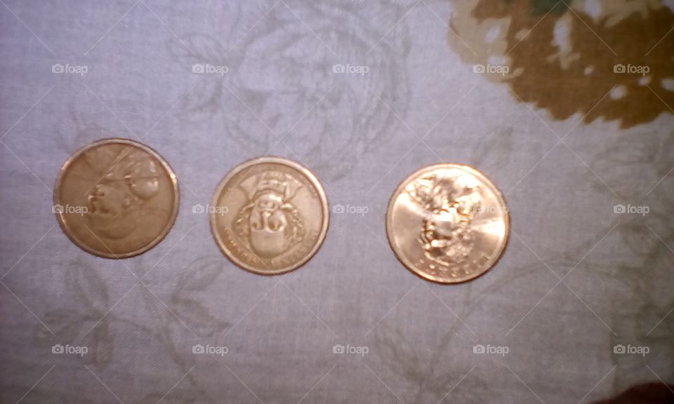 monedas de a $1.00 USD.