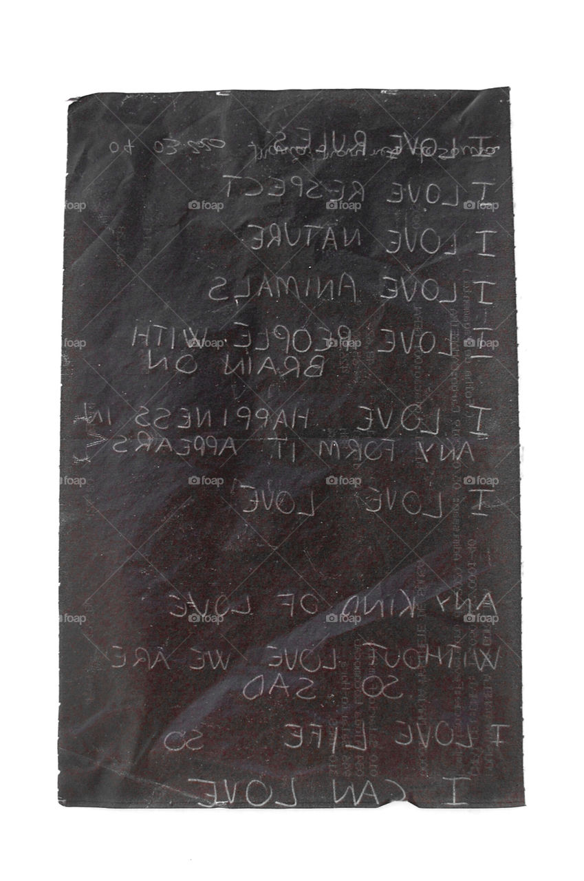 close-up of a sheet of black carbon paper used for an art work