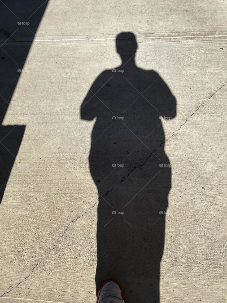 Walking in the sun, shadows on the sidewalk, walking in the shadows, sunshine on sidewalk as I walk