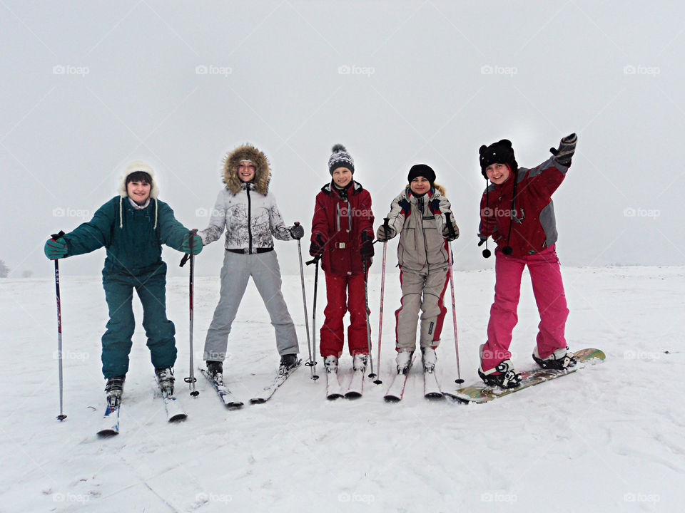 Group of friend having fun together in winter