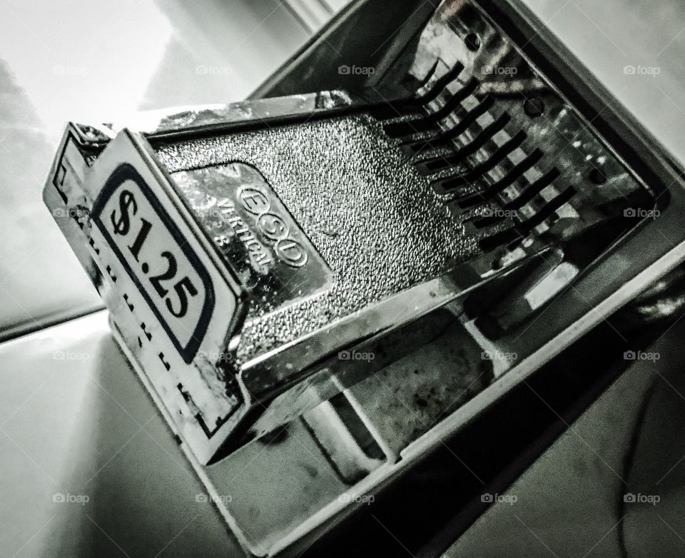 Coin operated washing machine coin slot mechanism. Got any quarters. 