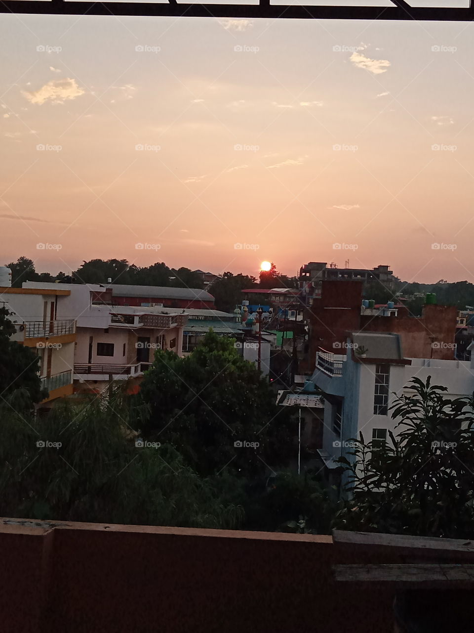 Setting sun paints the horizon with saffron