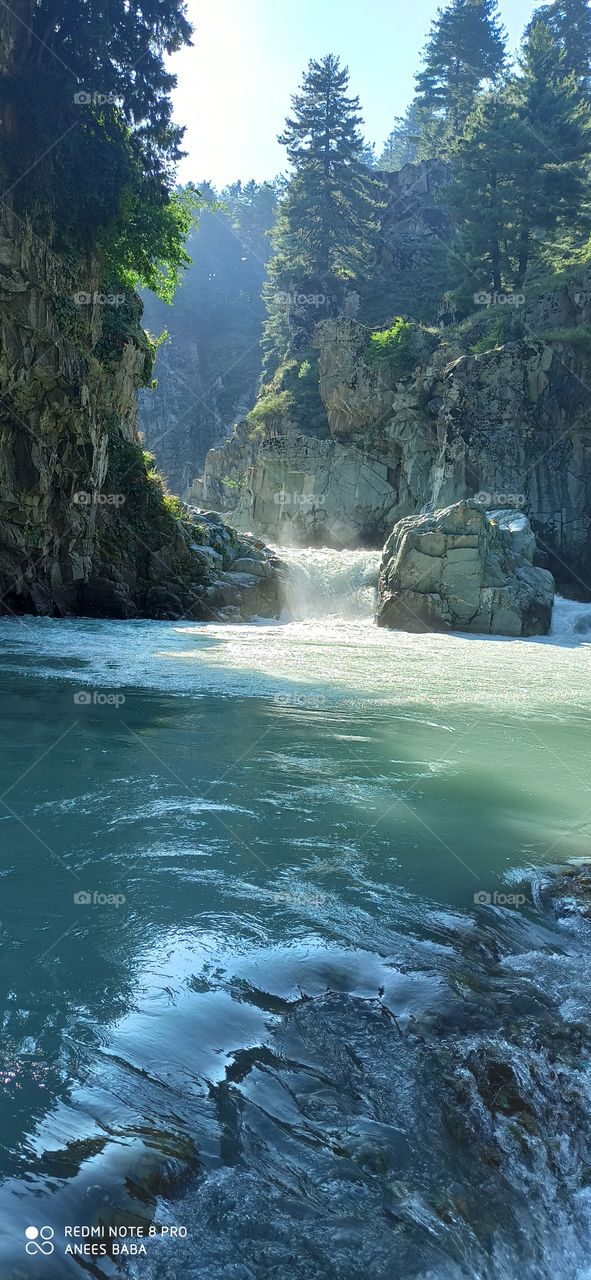 A colser view of deep,clean & cold Waters of Nallah "Vashouaw" at upper side of "Aharbhal"  water fall at  Aharbhal Shopian in Kashmir Valley...