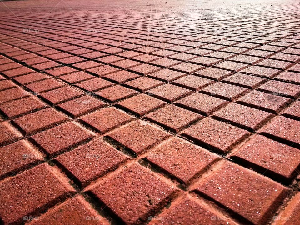 Red terracotta sidewalk