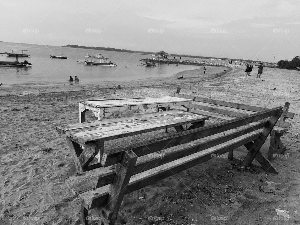 The perfect table and chair on the beach. They are perfect for dinner.