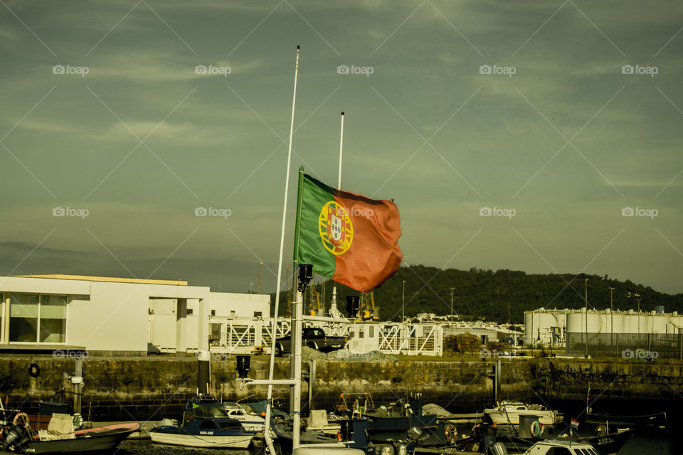 Portuguese Flag on a old boat at the local docks