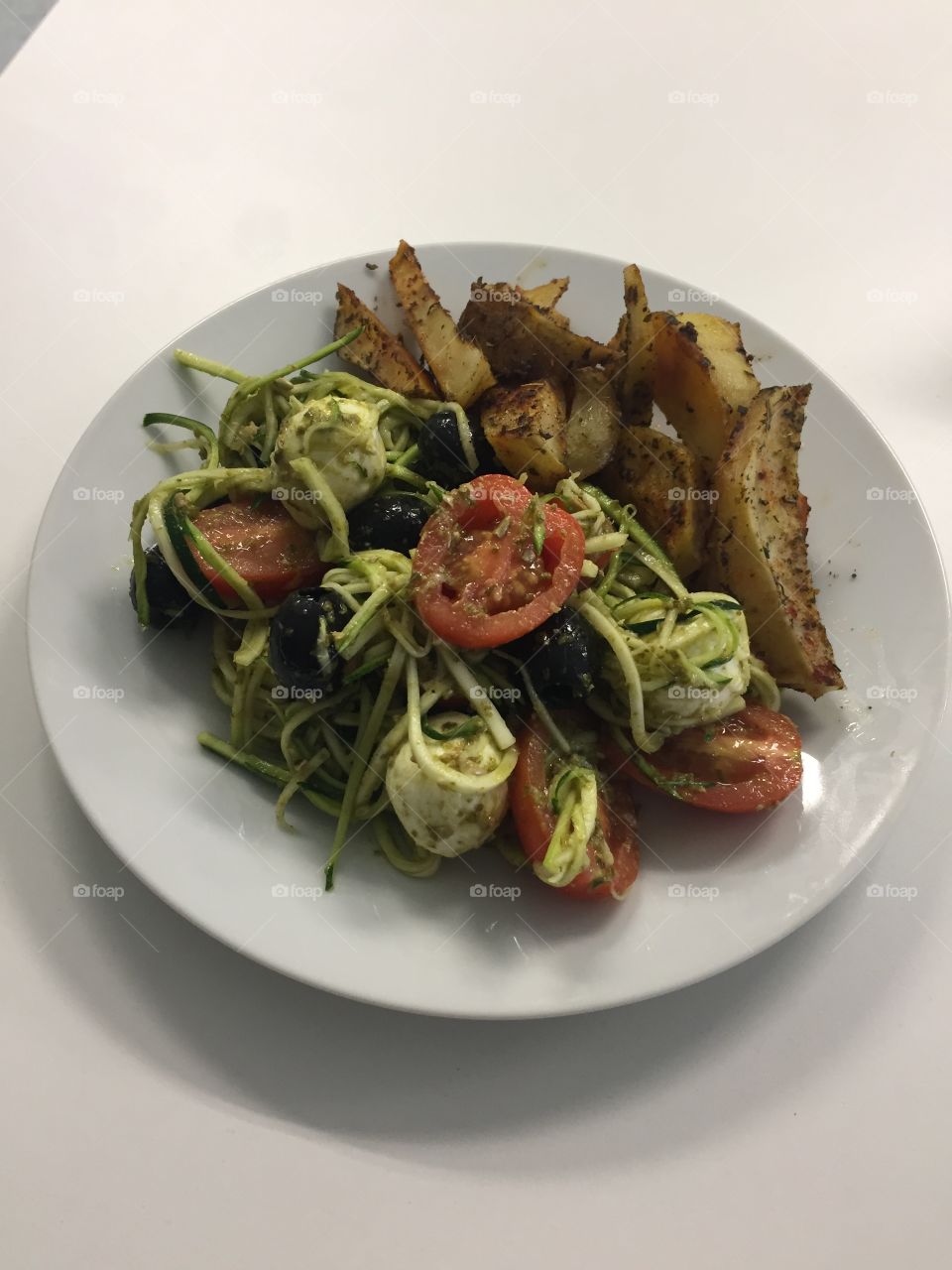 Zucchini salad and baked potatoes 