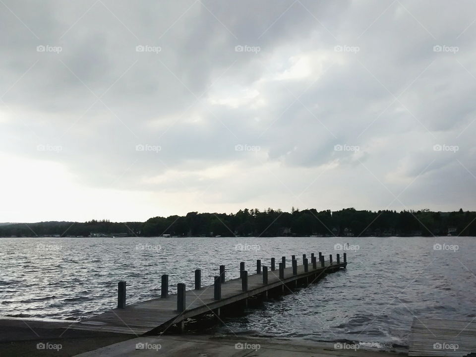 Dock on lake water shore
