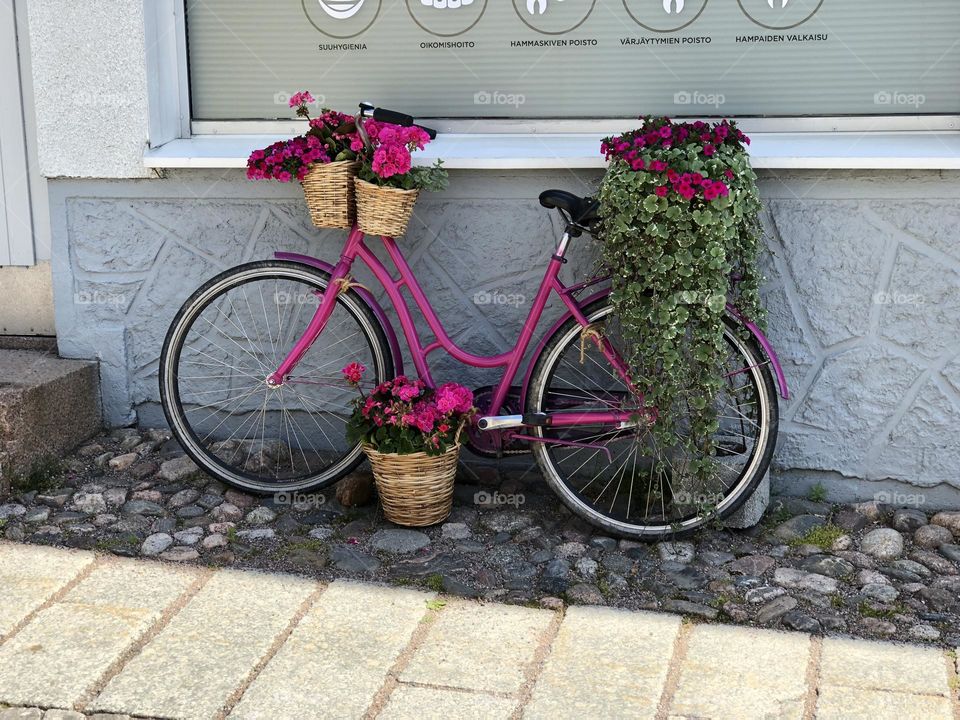 Pink bike with pink flowers 