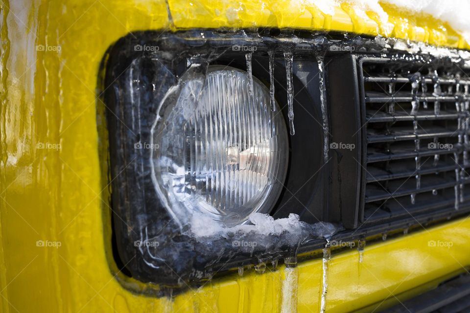 frozen car light , close up