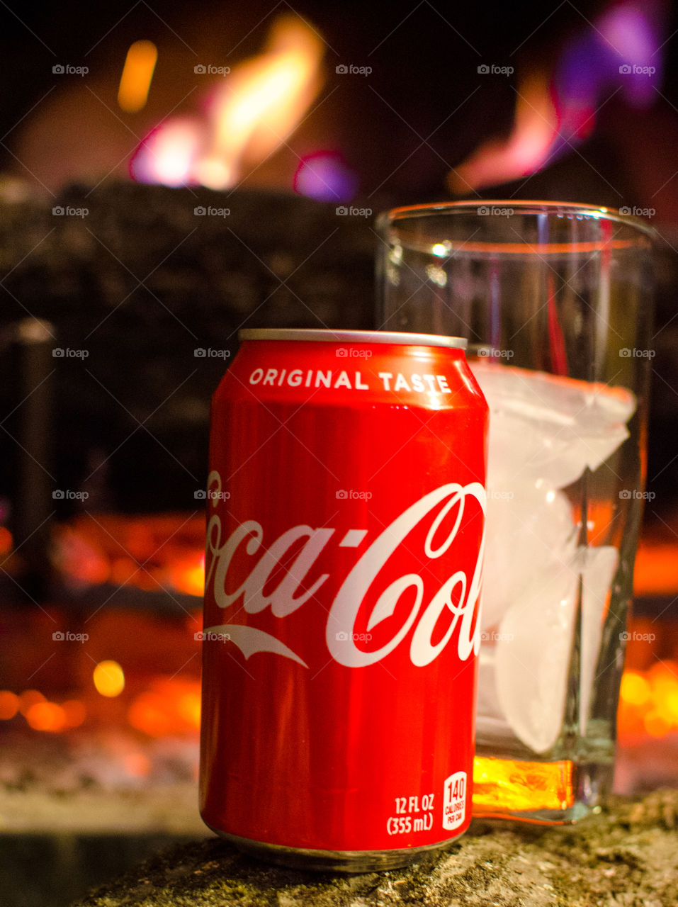 Enjoy a nice Coca-Cola in front of a warm fire