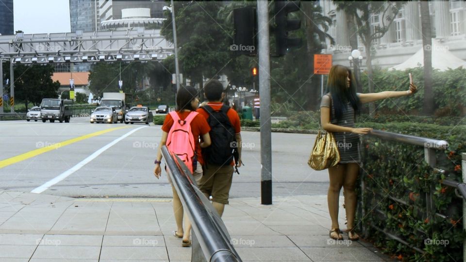 just be who you are..doesn't matter if you have a car or just wanna take the sidewalk..just be cool..don't bothered what people may think..even when you take the sidewalk just for a selfie...under the traffic lights...keep playing cool..