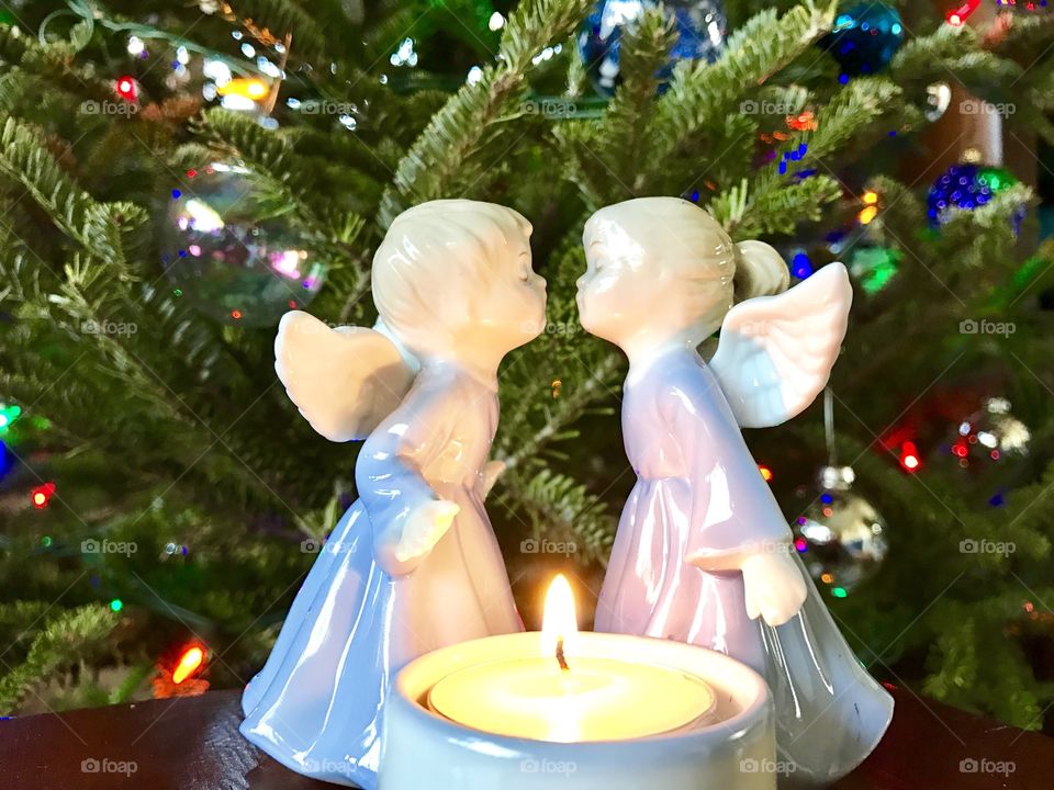 Kissing Angels by Christmas Tree
