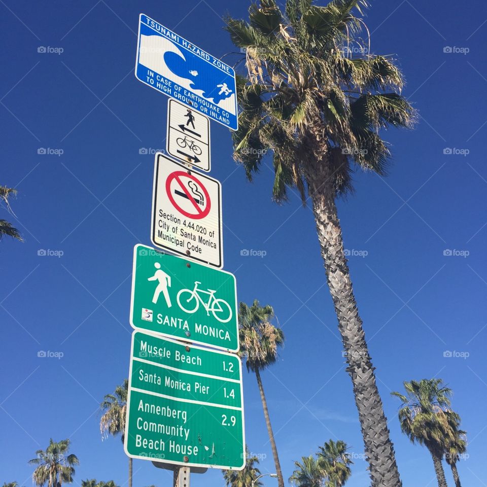 Signs in Venice Beach. Taken from the footpath in Venice Beach, CA.