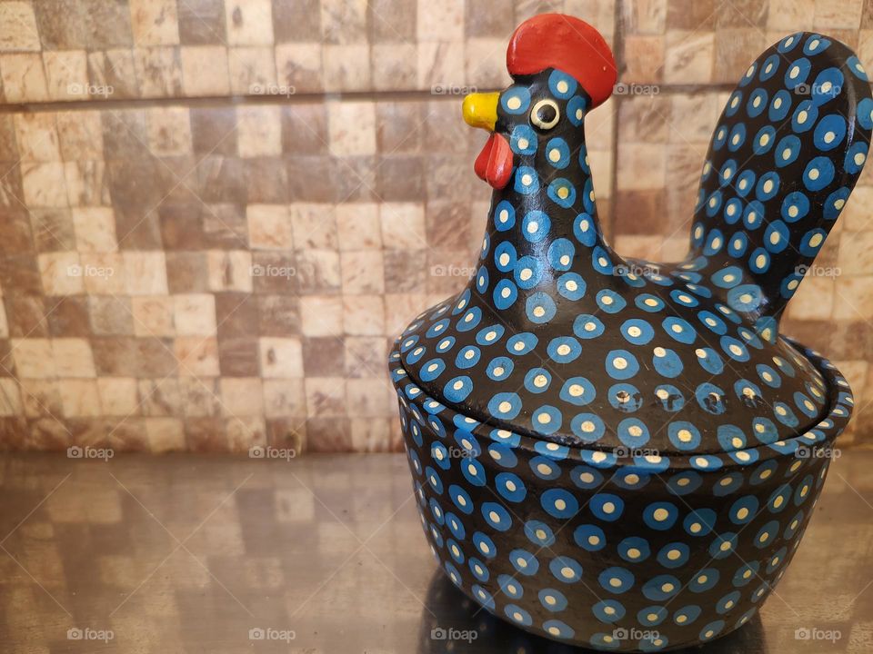 Crafts in the shape of a chicken, decoration object.