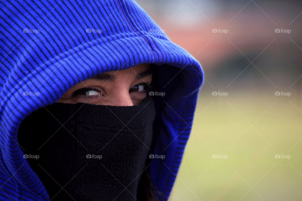 girl with face covered