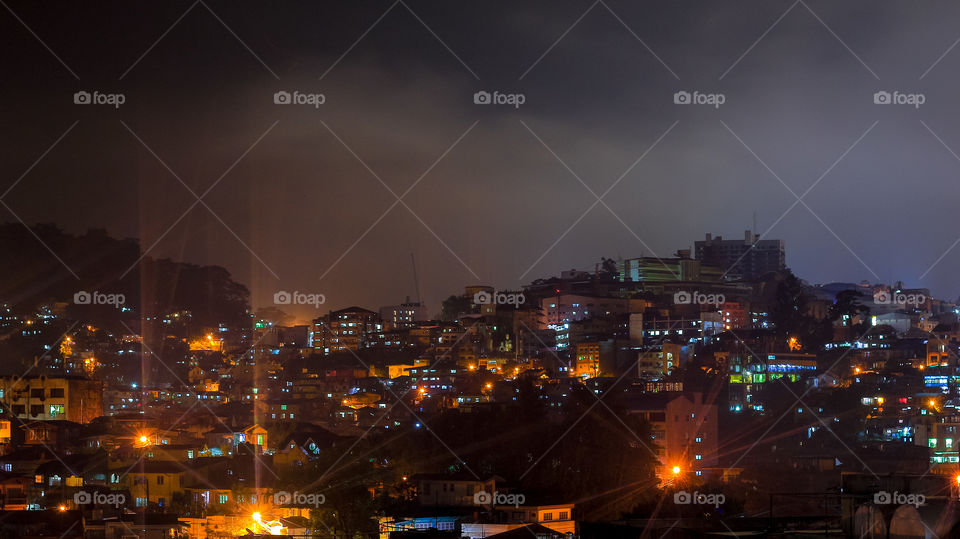 local houses lit up the city