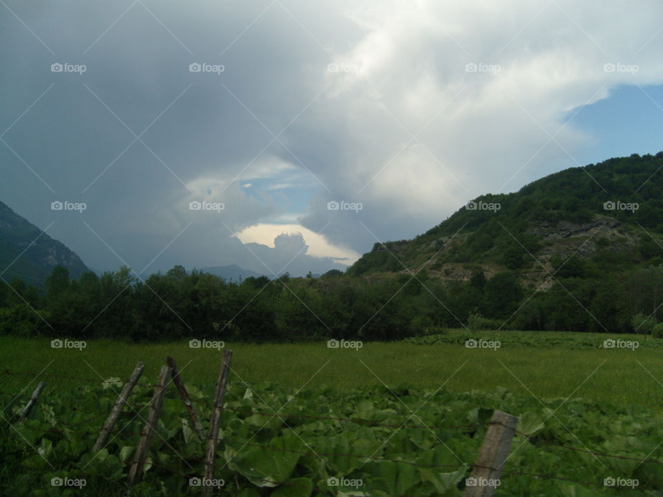 Mountain Prokletije Montenegro mountain landscape and cloudy sky
