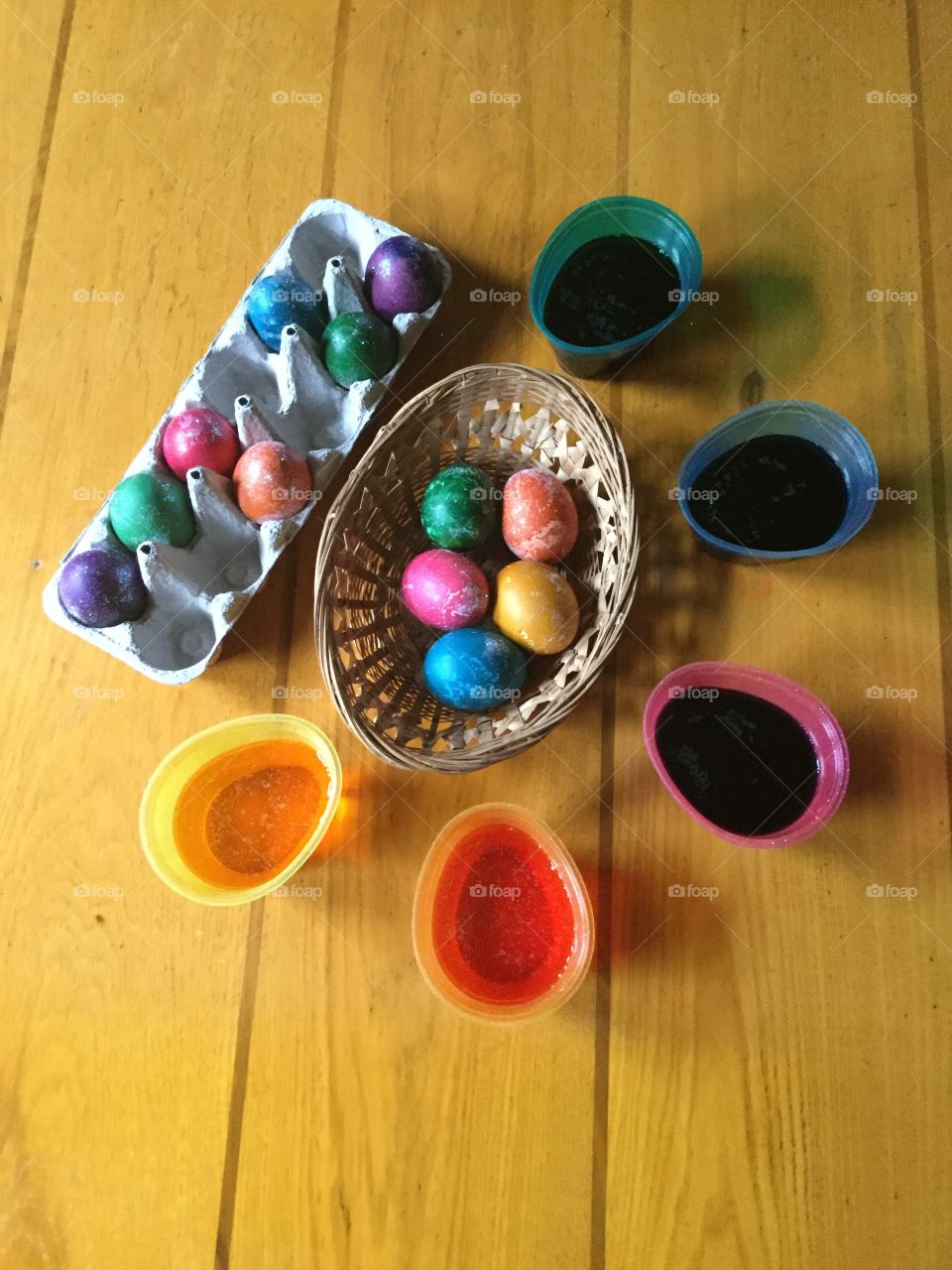 Dyeing eggs bright, vibrant, sparkling colors for Easter.