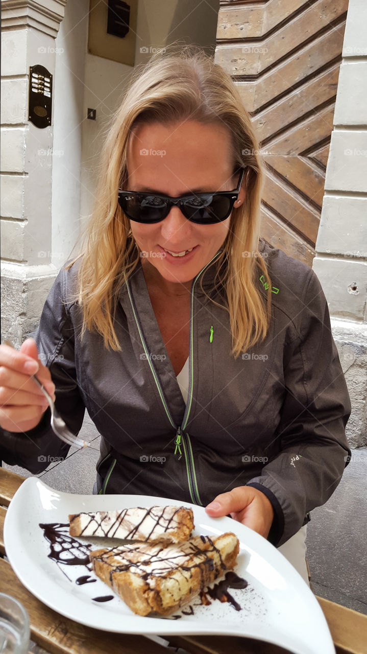 Eating a big delicious dessert 