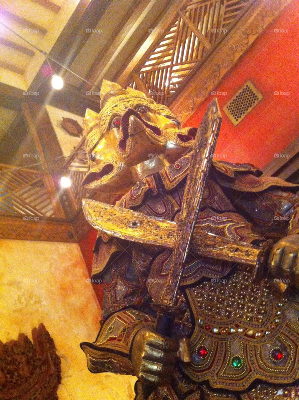 Statue in the Yak and Yeti . Taken looking up at a statue in the Yak and Yeti restaurant in Disney's Animal Kingdom. 