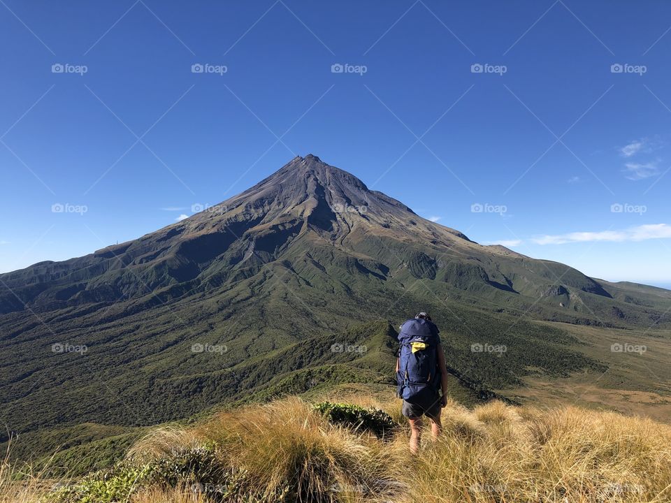 Trekking with an overnight pack for three days on the Pouakai Circuit with views of Mt Taranaki 