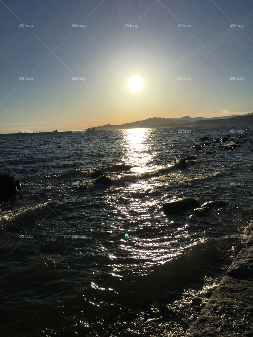 Scenic view of sun at sea
