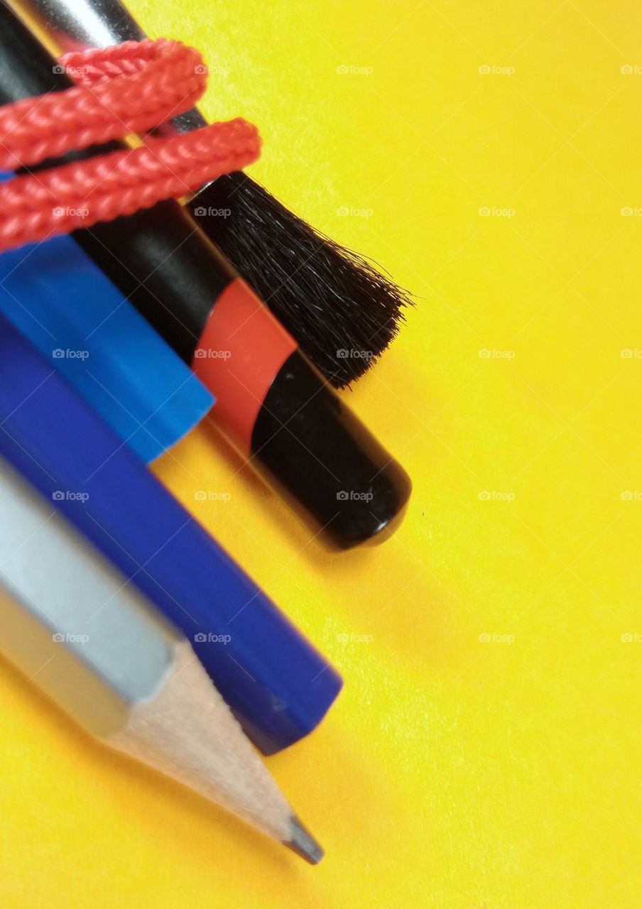 brush and the colorful pencils