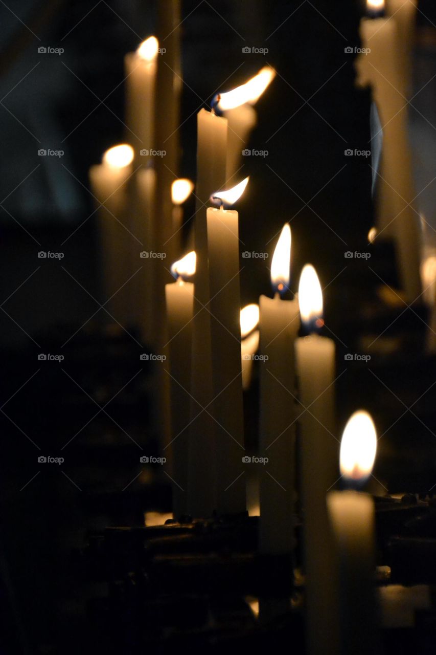 lit candles in church