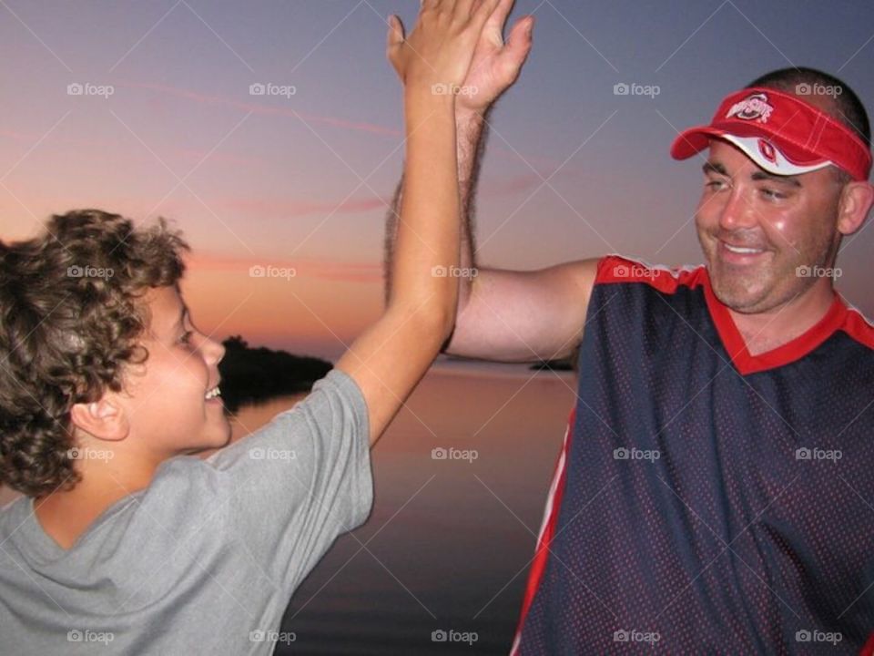 High Five- father and son.