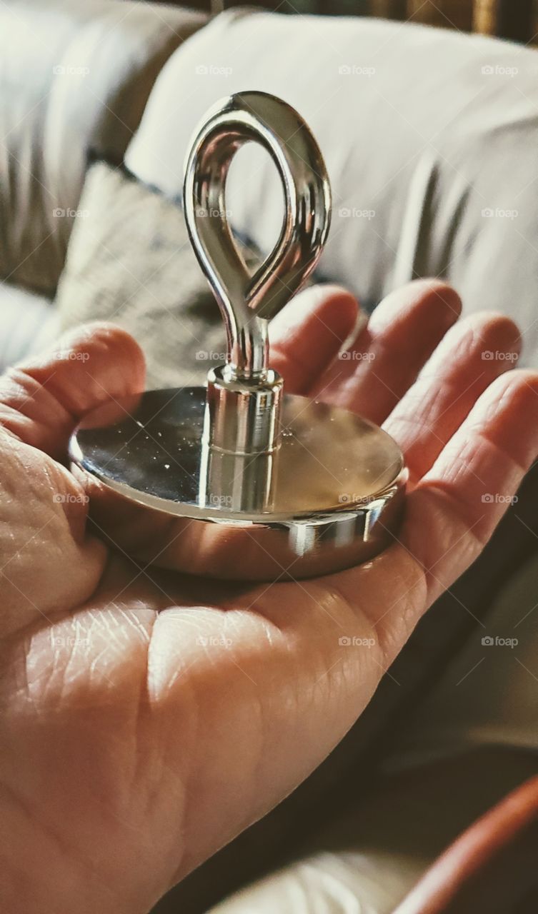 Monochromatic. Strong magnet can lift up to 300 lbs. Drag in water, pick up nuts & bolts, nails, great for tradesmen!