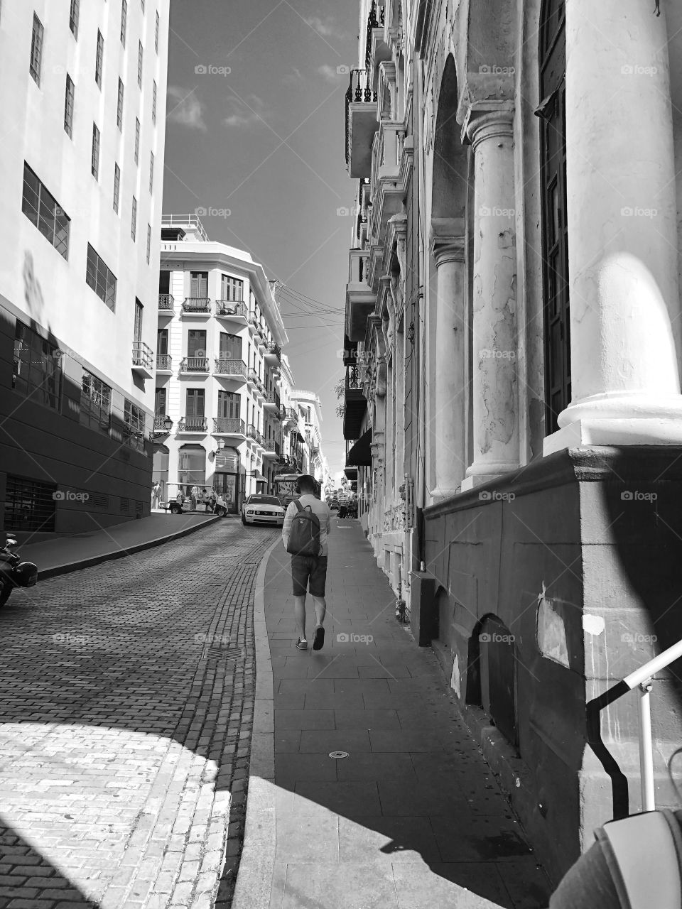 Man Walking down street, Black And White