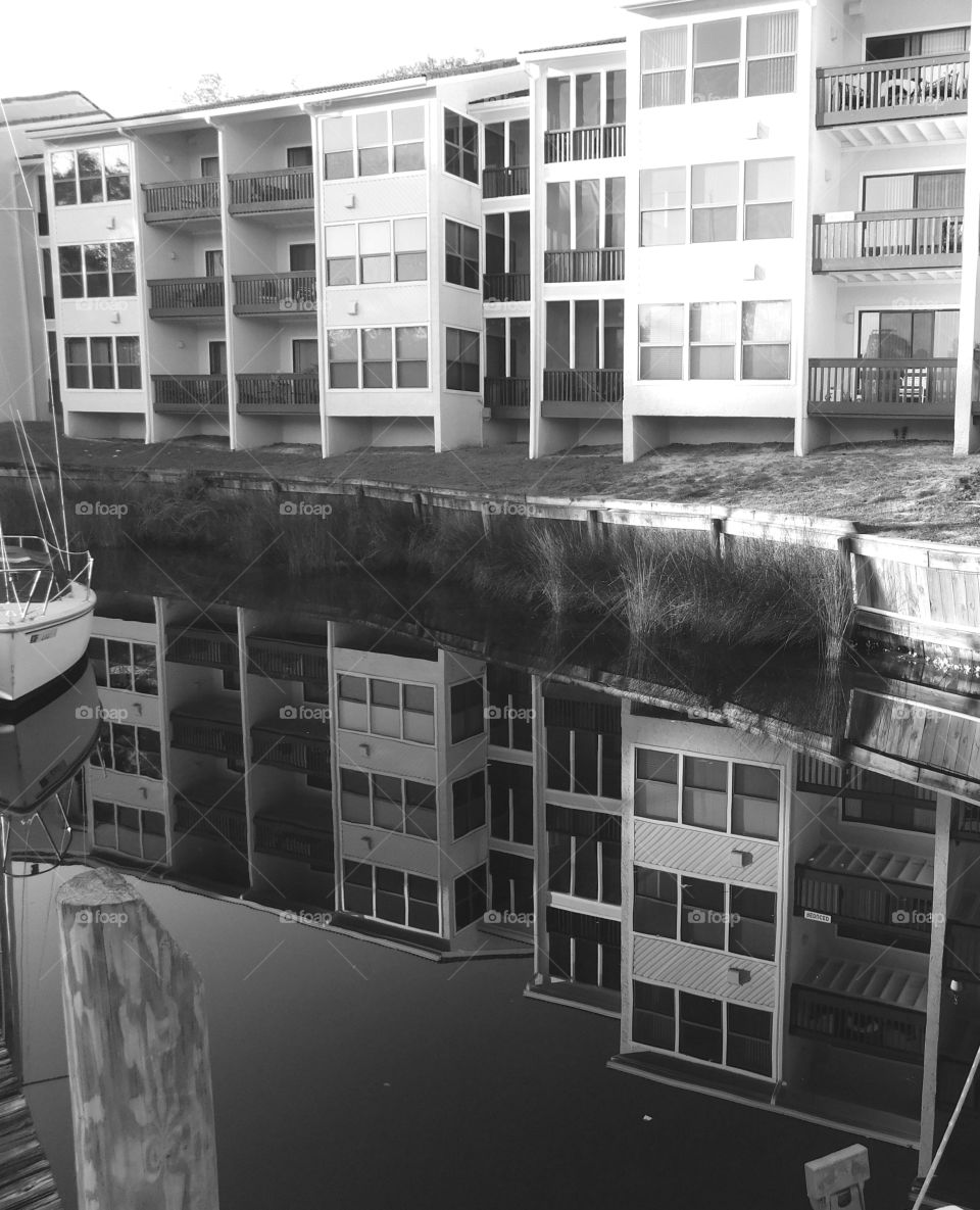 Black and white Kayak reflection