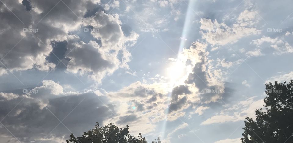 Radiant sun shining through the clouds 