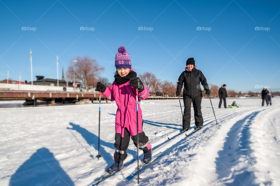 Family cross-country skiing activity.