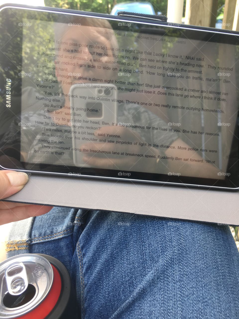 I love to sit outside, reading on my tablet