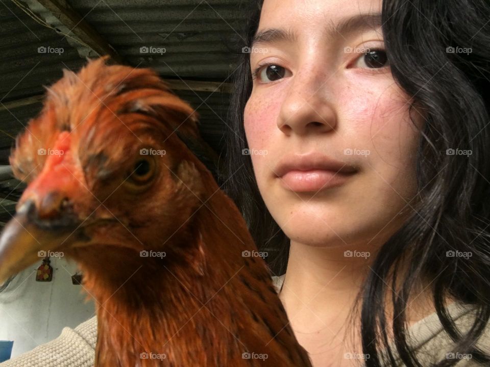 Beautiful woman and chicken