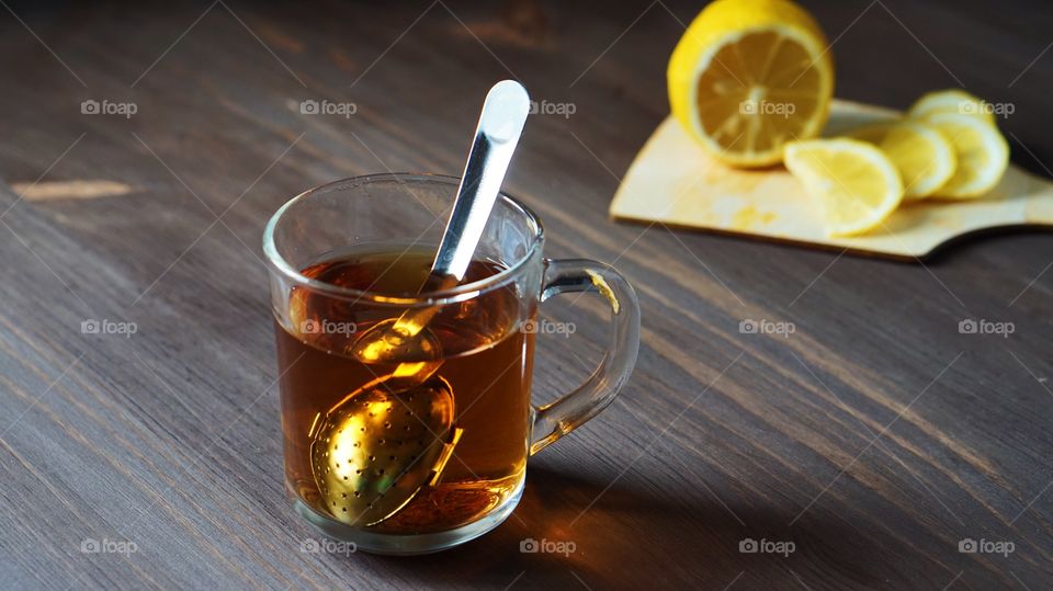 A glass of tea on table