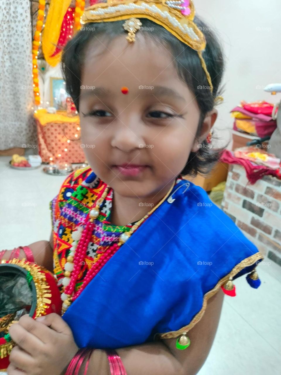 baby girl, decorated as lord krishna, janmashtami,