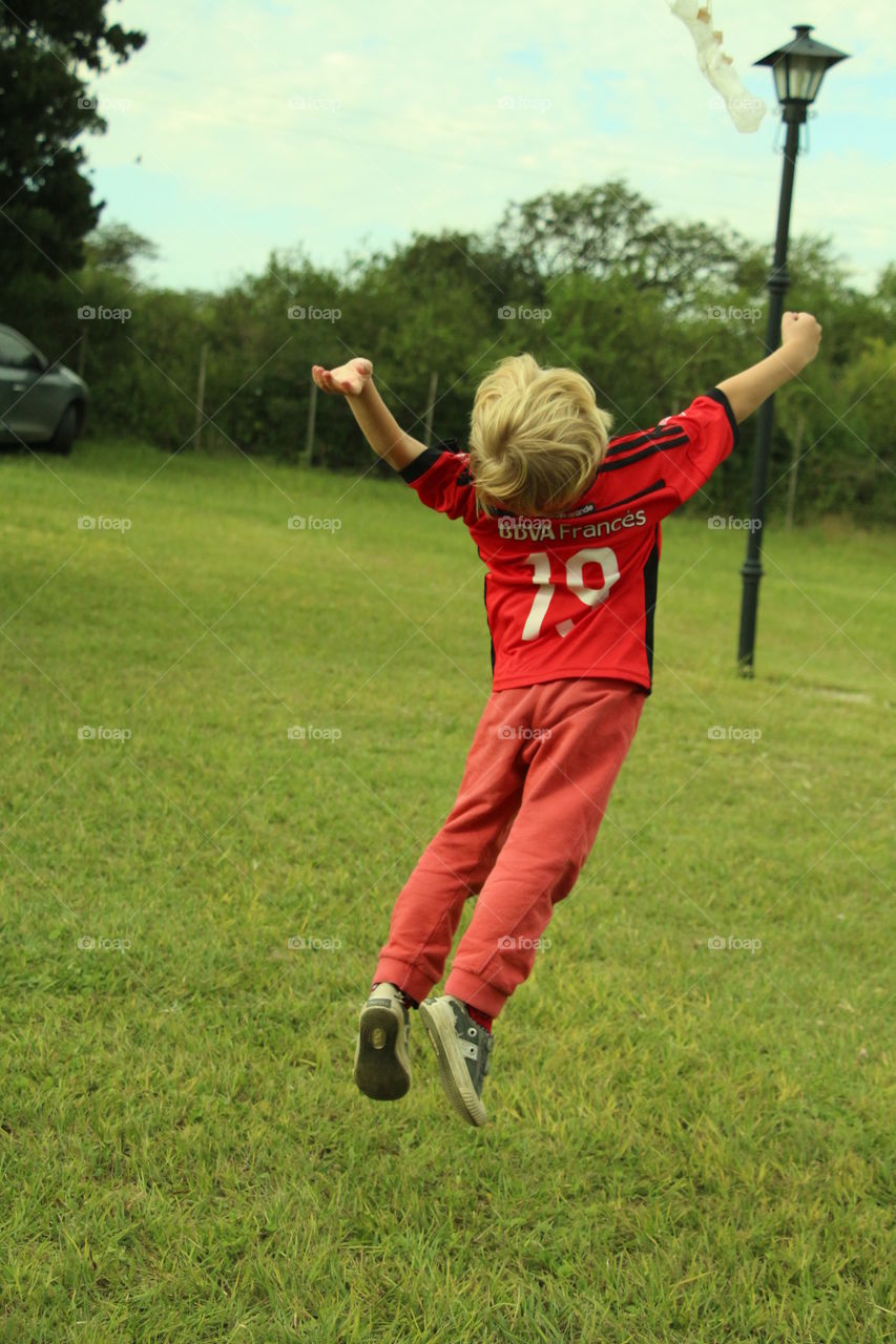 kid playing. kid jumping and playing