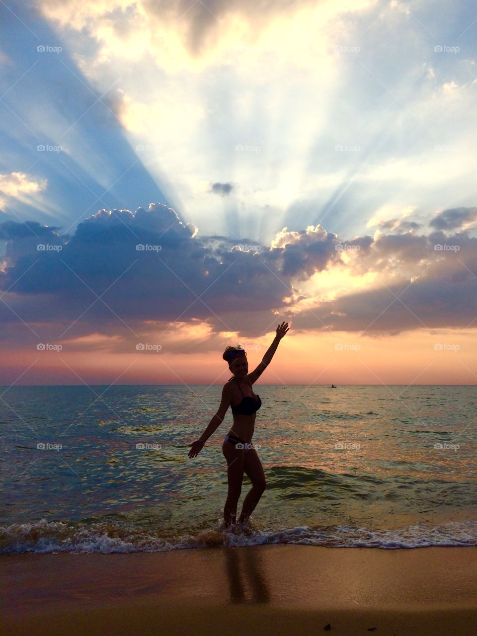 Silhouette at sunset on beach