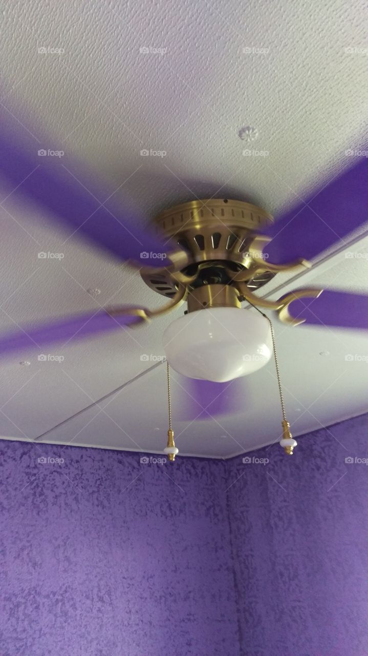 Purple ceiling fan in motion