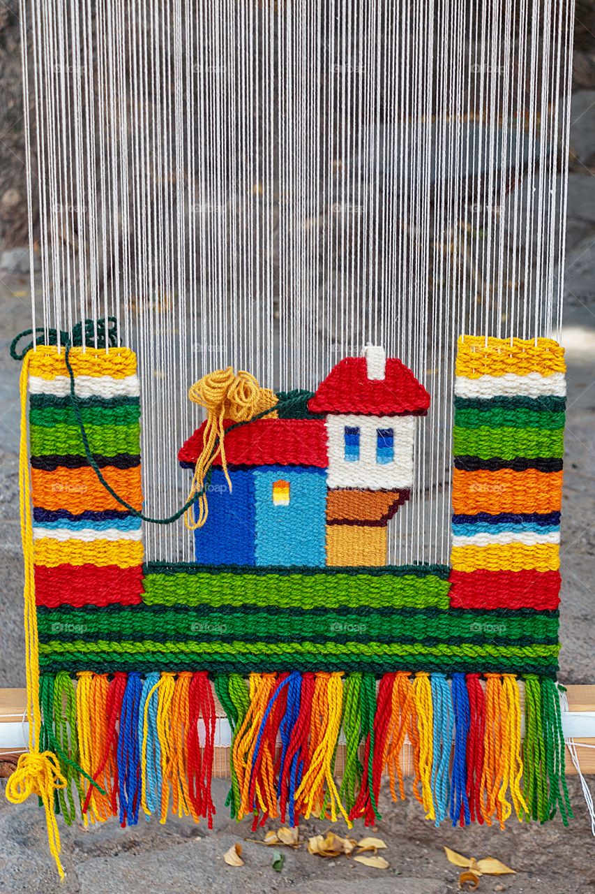 Beautiful colourful loom knitted canvas for a wall